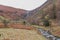 River in Autumn Fall, waterfall in distance, wide angle