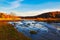 The river and autumn forest sunset