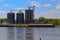 River Barge and Grain Bins on the Illinois River