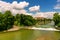 A river below a cloudy summer sky