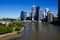 River bend with city skyline background