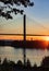 River and bridge at beautiful summer sunset. A view of the Alex Fraser Bridge from North Delta BC