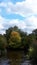 The River Calder from the bridge across it in Padiham own Centre.  This river powered 20 cotton weaving Mills in 1906,all