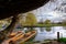 River Cam in Cambridge, England with moored punts at the shore