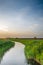 River canal running through meadow