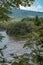 River with cascades and forest hills in Bieszczady Mountains, Poland