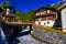 River and chalet in swiss village in Alps, Leukerbad, Leuk, Visp