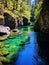 a river with clear water and rocks