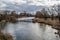 River on a cold winter day. Peaceful water in the river and on a cold gray day in the Winter countryside