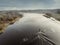 River Corrib in county Galway, Ireland. Aerial drone view. Cloudy sky. Small fishing boat