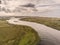 River Corrib, county Galway, one small motor boat moving toward the lake, Aerial drone shot, High angle