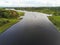 River Corrib, county Galway, one small motor boat moving toward viewer, Aerial drone shot, High angle