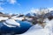 River and covered with snow banks in russian polar city