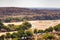 River crossing the desert landscape of Mapungubwe National Park, travel destination in South Africa. Braided Acacia and huge Baoba