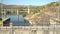 River cruise boat slowly enters the lock of the Pocinho dam on the River Douro in Portugal