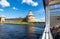 River cruise ship sailing on the Neva river to historical fortress Oreshek