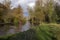 River cutting its way through autumn park