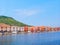 River embankment in the city of Bosa with colorful, typical Italian houses. province of Oristano, Sardinia, Italy.