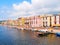 River embankment in the city of Bosa with colorful, typical Italian houses. province of Oristano, Sardinia, Italy.