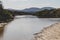 River estuary across the beach meeting the South Pacific Ocean in Marion Bay