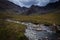 River in the Fairy Pools on the Isle of Skye under a stormy sky, Scotland, United Kingdom