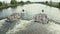 River flowing through a dam structure with a boat chute