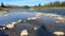 River flowing over rocks on a sunny fall day