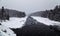 A river flows through Algonquin Provincial Park in winter