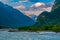 The river flows in a deep gorge, the mountains of Caucasus