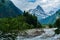 The river flows in a deep gorge, the mountains of Caucasus