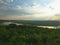 River, forest and sky at sunset