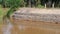 A river with gabion walls  in kluang, johor