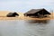 The river, huts and the sand dunes. MaranhÃ£o state, Brazil