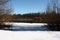 The river without ice. View from the coast.