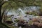 River with large granite stones. Steppe. Nature