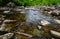 A river with large stones in Scottish highlands