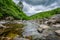 A river with large stones in Scottish highlands