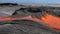 River Of Lava with selective focus . Hot lava floating from active volcano