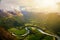 River meanders around fields seen from Romsdalseggen ridge, Andalsnes, Norway