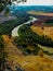 River meanders curvature with lush banks vegetation