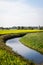 A river meanders through fields