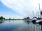 River Minija, ships and beautiful cloudy sky. Lithuania