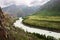 River, mountains and clouds.