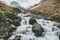 River in mountains landscape flowing clear water