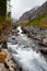 River, mountains and woods.