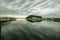 River mouth with clouds loaded with rain