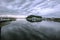 River mouth with clouds loaded with rain