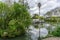 River Nabao floating through Tomar, Portugal. garden