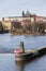 River navigation sign on Vltava with Hradcany castle, Prague, Bohemia