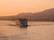 A river Nile cruise boat at sunset